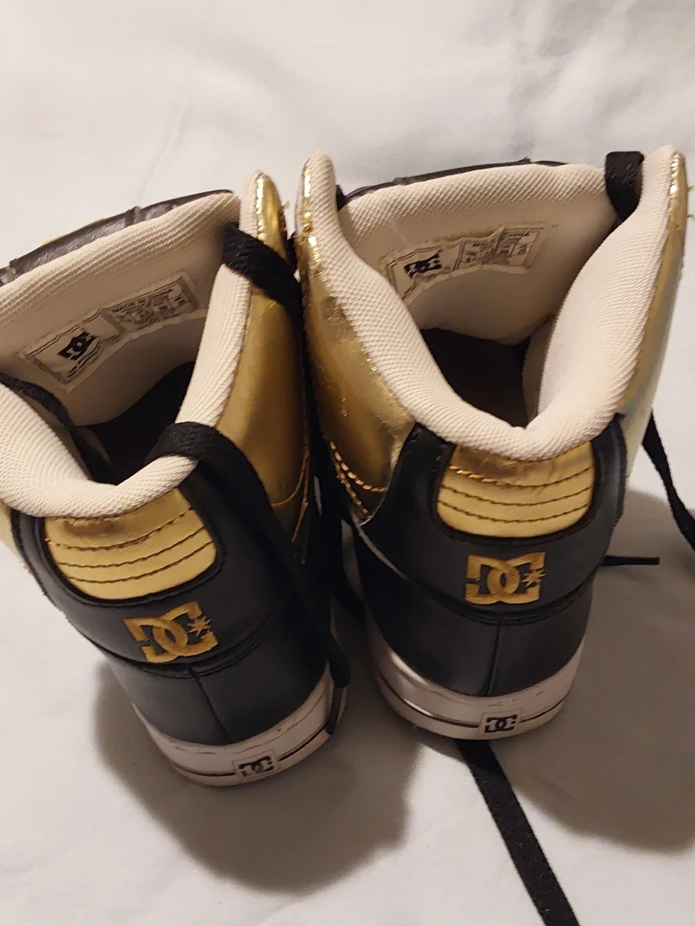 DC Kids Black and Gold High-Top Skate Sneakers